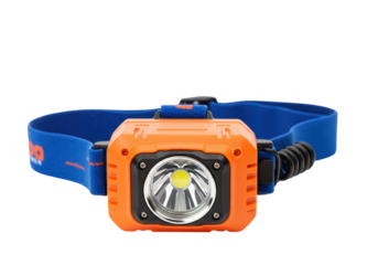 Orange headlamp isolated on white, portable lighting device for outdoor activities and camping