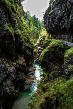 Hiking Girl On Spectacular Trail Triftsteig Through Canyon Tiefenbachklamm With Brandenburger Ache In Tyrol, Austria