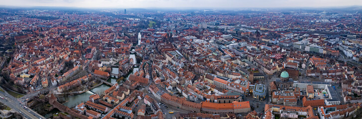 Obraz premium Aerial view around the old town of Nuremberg in Germany on a cloudy autumn day