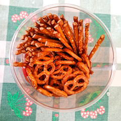 Crunchy savory sticks arranged neatly on rustic surface top view