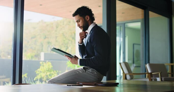 Business, man and thinking with tablet in office for research, proofreading article and update draft. Person, digital and ideas with editor feedback, review newsletter and information for publication