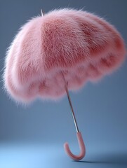  luxurious pink feather umbrella with delicate fur texture on blue studio background elegant accessory concept