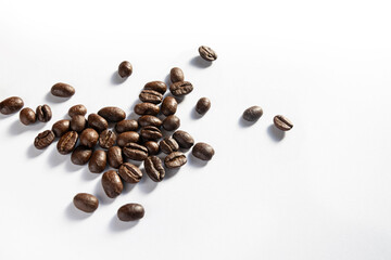 pile of coffee beans on a white background, isolated, sharp