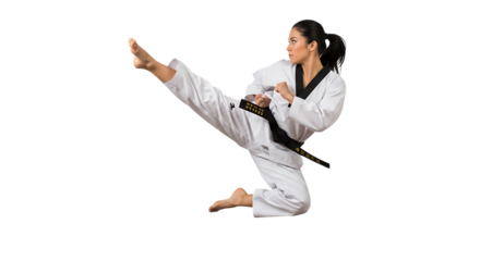 Young woman in martial arts uniform performing a high kick isolated on transparent background