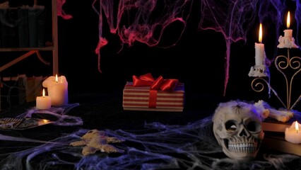 Halloween Theme with Skull, Webs, and Candlelit Scene