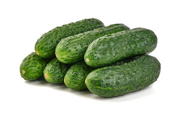 Fresh Green Cucumbers Stacked, isolated on white background