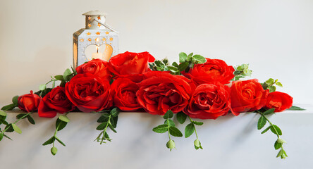 Bouquet of red roses on the table