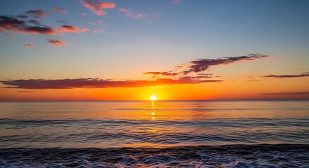 Obraz premium Vibrant Sunset Colors Painting the Sky and Reflecting on Calm Ocean Waters with a Serene Horizon