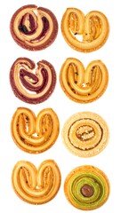 Fototapeta premium Eight colorful, heart-shaped cookies arranged on white