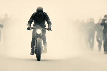 Mysterious Ride: A lone rider, cloaked in darkness, fearlessly commands a sleek motorcycle amidst an ethereal haze, evoking a sense of adventure and solitude. The image showcases a journey.