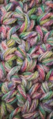 Fondo de textura de superficie de punto con hilos de lana de varios colores