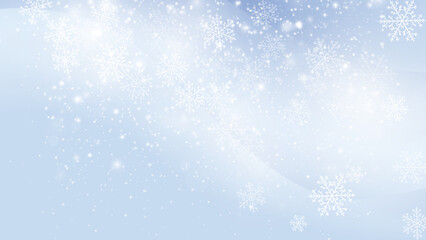 雪の結晶が舞う冬の幻想的な背景素材
