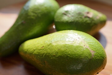 Fresh green avocados, a healthy and delicious fruit, perfect for nutritious meals and snacks