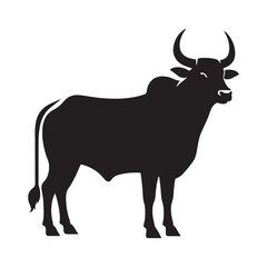 Silhouette of a majestic bull with prominent horns standing on a grassy field