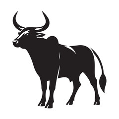 Silhouette of a majestic bull with prominent horns standing on a grassy field