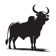 Silhouette of a majestic bull with prominent horns standing on a grassy field