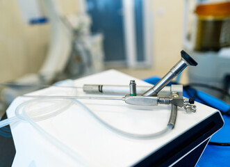 Fiber optic endoscope on medical unit. Endoscopic cable and handle on medical equipment