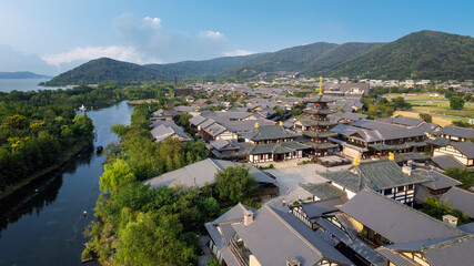 Aerial View of Traditional Asian Architectural Complex by River