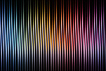 Colorful abstract background featuring vertical ribbed lines with a vibrant spectrum of blue, yellow, red, and purple hues