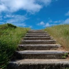 Stone steps lead upward through green grass under a vibrant blue sky with scattered clouds