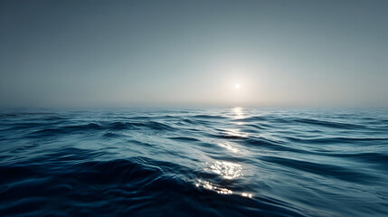 Obraz premium Tranquil ocean view at dawn with gentle waves and clear sky