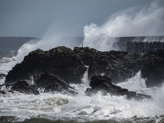 crashing waves over Holyhead breakwater isle of Anglesey