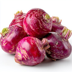 A close up shot of a pile of red turnips against a white background in a studio setting today