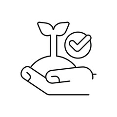 A hand holds a seedling with a checkmark nearby