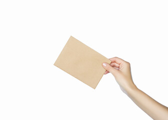 Hand holding a brown envelope against a white backdrop