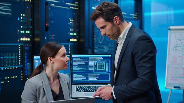 Dynamic tech team collaborating on data analysis in modern server room environment, professional feel - Powered by Adobe