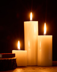 Still life photograph of lit candles in lovely great indoor environmen