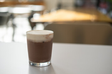 A glass of iced chocolate on the table