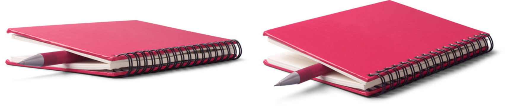 set of pink spiral-bound hardcover notebook with pen tucked between pages like bookmark isolated white background, writing, journaling, and education concept