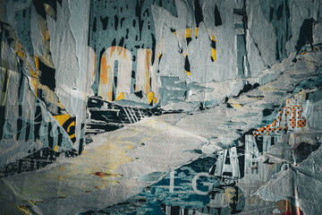 Fototapeta premium Old ripped torn posters on old billboard in city