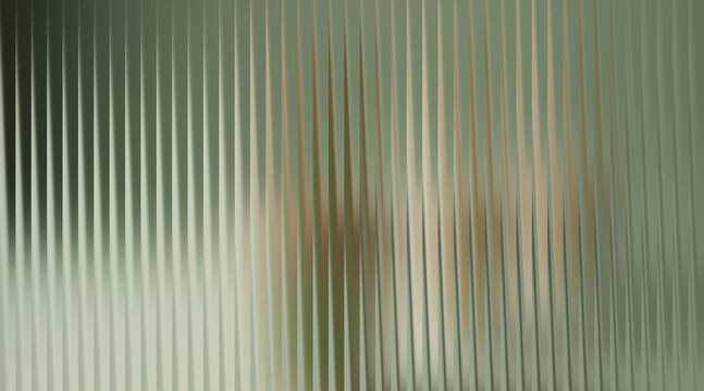 Textured glass with vertical ribs and blurred background