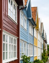 Obraz premium Row of colorful houses, vibrant colored facades