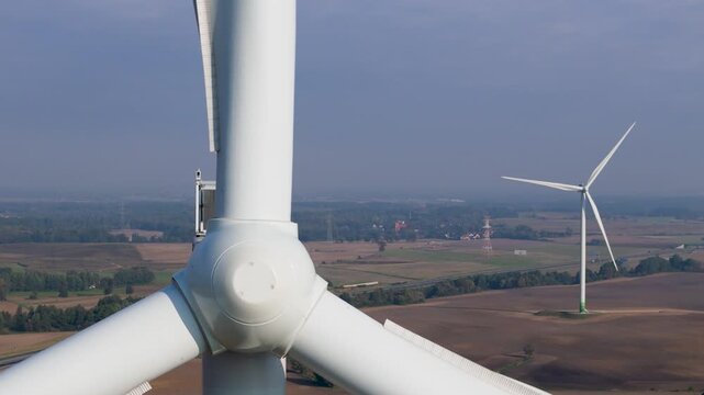 Close-Up of Modern Wind Turbine Blades and Hub Producing Clean Renewable Energy