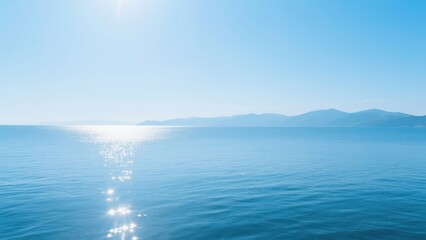 Fototapeta premium Serene ocean under clear blue sky