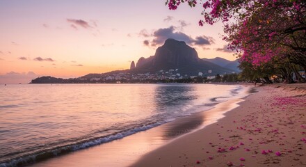 Serene Sunset Beach Scene with Mountain Backdrop and Pink Flowers