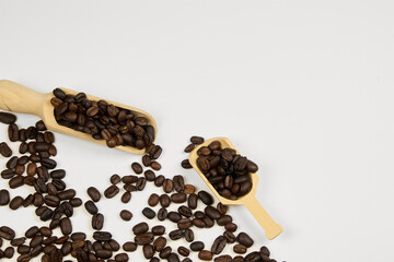 Coffee beans, close-up with copy space on a white background, studio shot