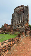 Wat Chaiwatthanaram in Ayutthaya, Thailand. Scenic ruins of the Buddhist temple in the ancient city. Buildings destroyed by time.