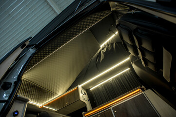 Obraz premium Comfortable interior of a passenger bus with soft seats