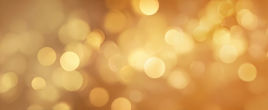 The golden bokeh background with warm glowing lights and soft festive blur