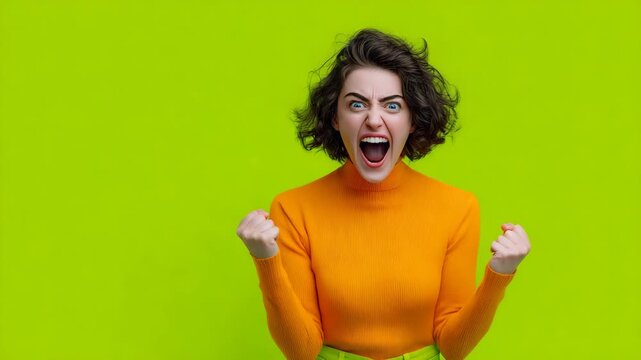 Joyful woman in bright outfit celebrates success!