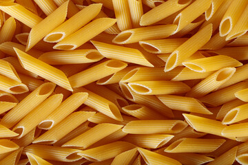 Golden Yellow Penne Pasta Tubes with Wheat Durum Top View
