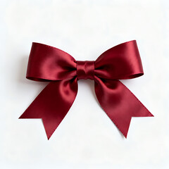 Fototapeta premium Red satin ribbon bow isolated on white background 