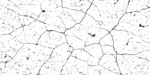 Grunge textured surface of an old cracked concrete wall with peeling paint and dry plaster