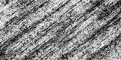 A rough black and white texture of vintage leather and fabric creates a grunge pattern on the surface