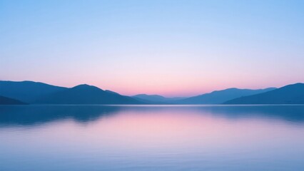 Obraz premium Serene lake at dawn with mountains
