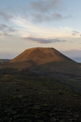 hiking on volcanoes at sunset in Lanzarote